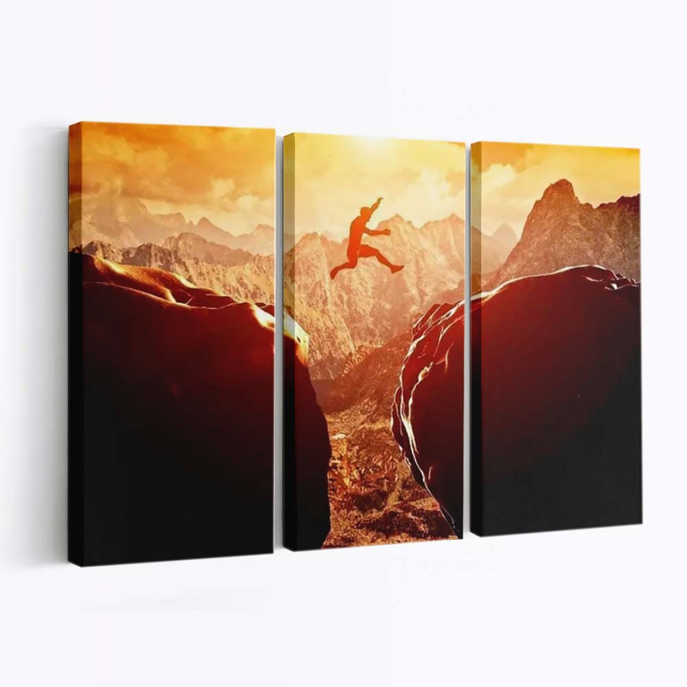 Man Jumping Over Precipice Between Two Rocky Mountains Canvas Wall Art, Bedroom Wall Art, Framed Canvas
